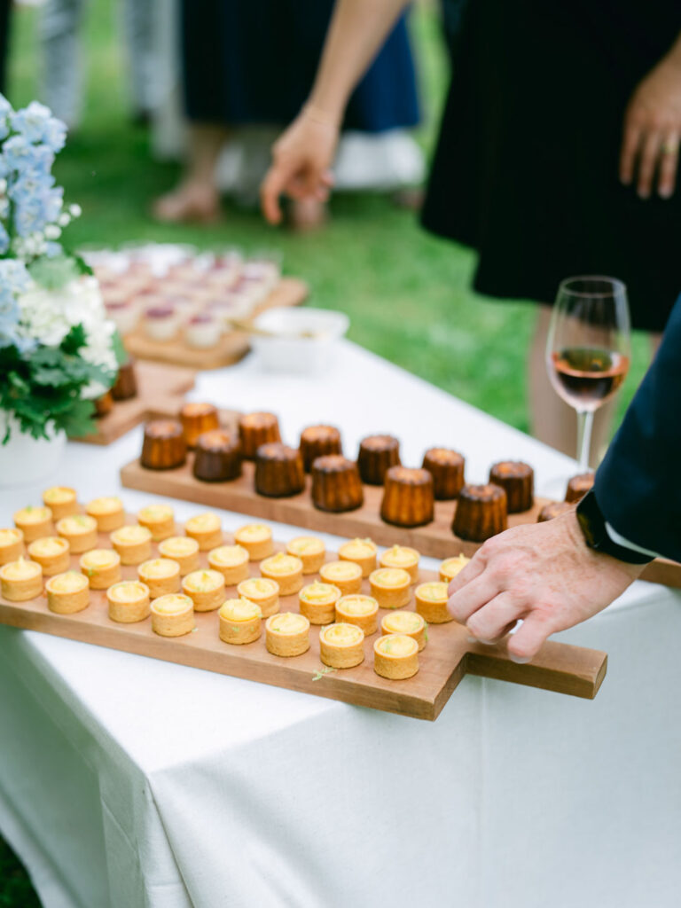 Beautiful dessert table with an assortment of French pastries at Kevin and Steven's wedding reception