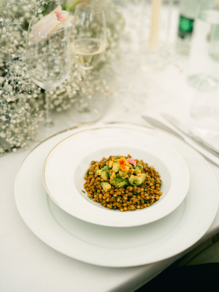 plated dish of lentils topped with fresh vegetables, served at Kevin and Steven's wedding reception