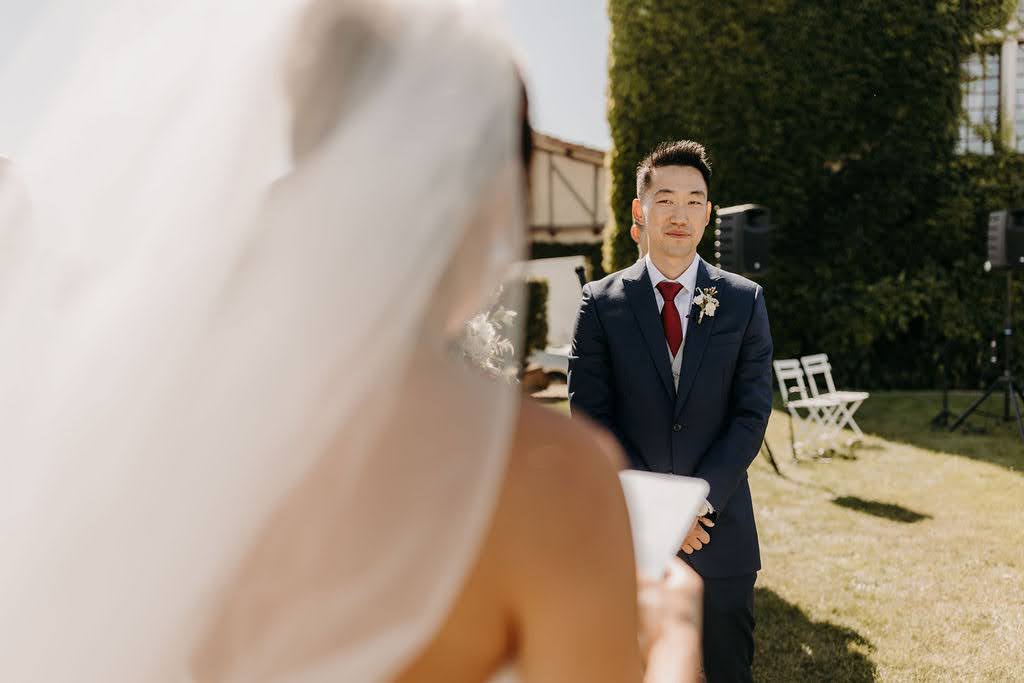 Groom’s emotional first look at his bride.
