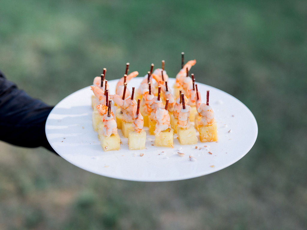 Pineapple shrimp skewers served as wedding appetizers.