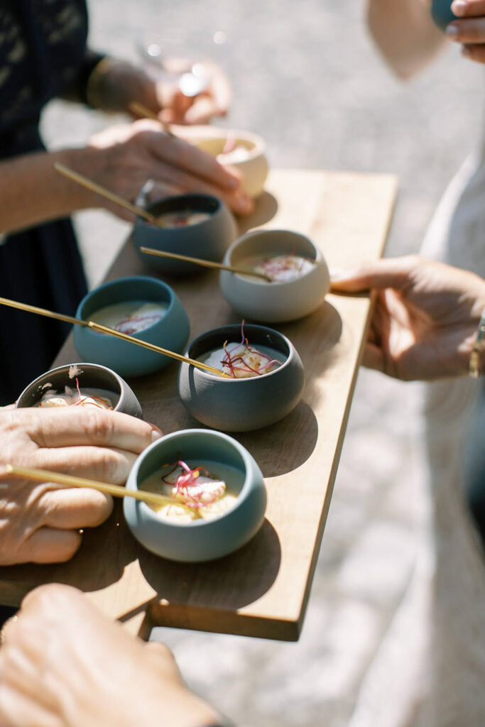 Elegant hors d'oeuvres being served to guests during cocktail hour.