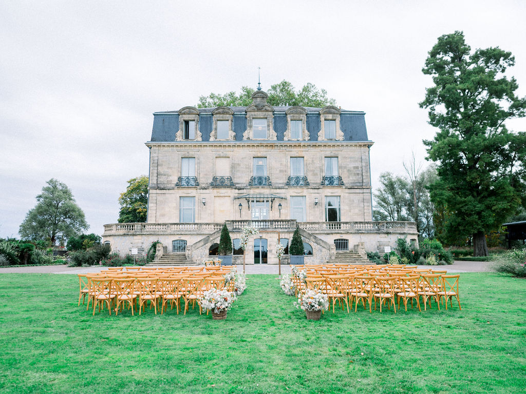 Château Grattequina ready for riverside wedding ceremony with floral aisle